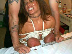 Bruised tits in hard bondage